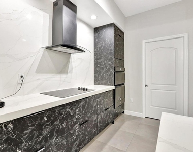 801 S Olive Avenue - Photo Thumbnail 13