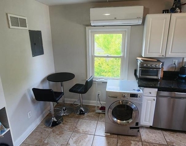 1227 N Utah Street - Photo Thumbnail 2
