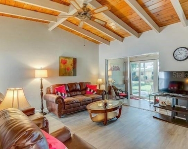 6006 Midnight Pass Road - Photo Thumbnail 1