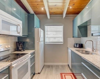 6006 Midnight Pass Road - Photo Thumbnail 4