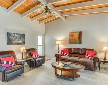 6006 Midnight Pass Road - Photo Thumbnail 2