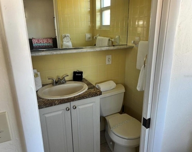 6006 Midnight Pass Road - Photo Thumbnail 10