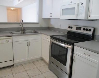 5045 Wiles Road - Photo Thumbnail 2