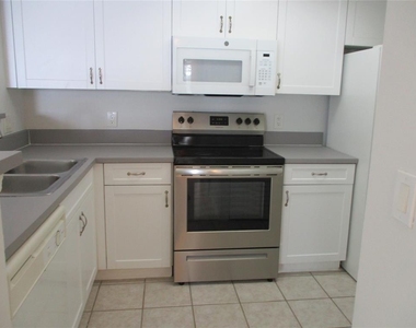 5045 Wiles Road - Photo Thumbnail 1