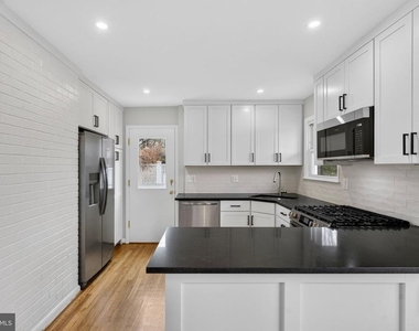 7507 Murillo Street - Photo Thumbnail 21