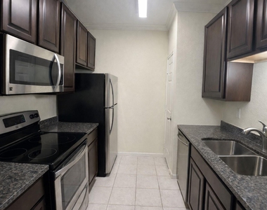 10049 Westpark Drive - Photo Thumbnail 5