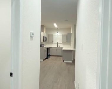 9719 Pelsey Street - Photo Thumbnail 3