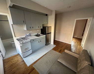 370 West 52nd Street - Photo Thumbnail 1