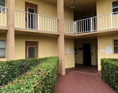 8590 Sunrise Lakes Boulevard - Photo Thumbnail 1