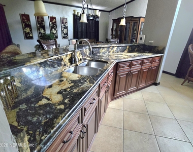 6931 Cane Grass Lane E - Photo Thumbnail 5
