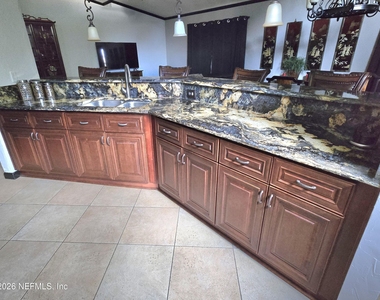 6931 Cane Grass Lane E - Photo Thumbnail 4