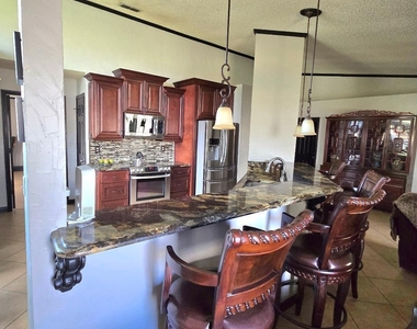 6931 Cane Grass Lane E - Photo Thumbnail 10