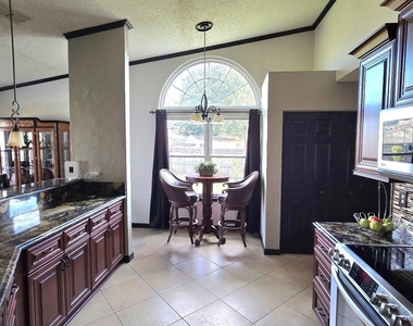 6931 Cane Grass Lane E - Photo Thumbnail 7