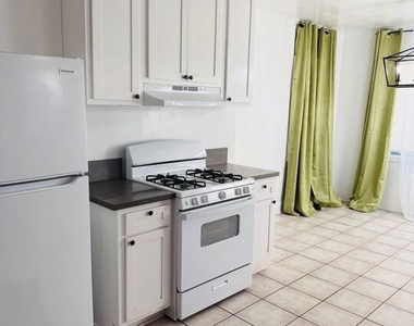 1100 W 48th Street - Photo Thumbnail 2
