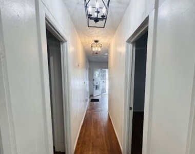1100 W 48th Street - Photo Thumbnail 6