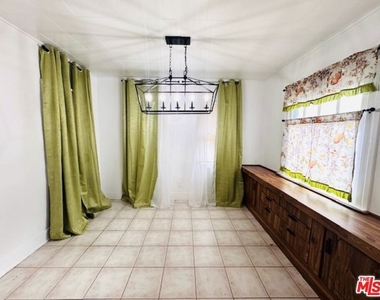 1100 W 48th Street - Photo Thumbnail 3