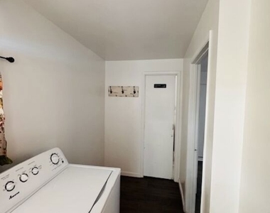1100 W 48th Street - Photo Thumbnail 5