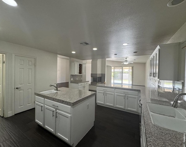 74081 W Petunia Place - Photo Thumbnail 3