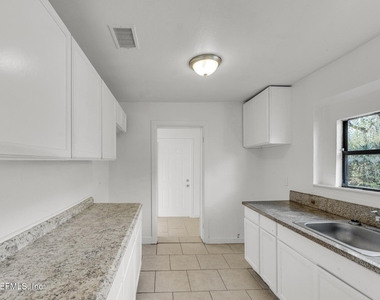 1830 W 27th Street - Photo Thumbnail 8