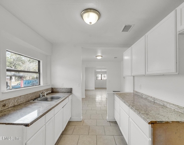 1830 W 27th Street - Photo Thumbnail 9
