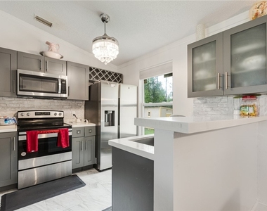 503 E 13th Street - Photo Thumbnail 4
