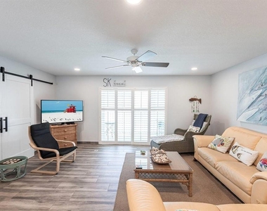 6154 Midnight Pass Road - Photo Thumbnail 4