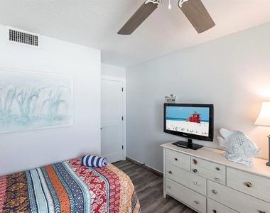 6154 Midnight Pass Road - Photo Thumbnail 6