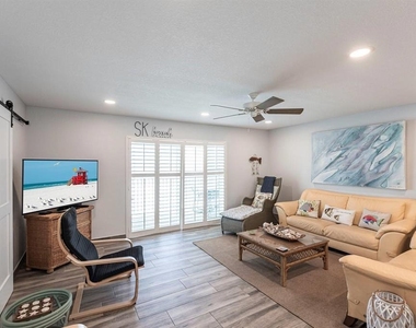 6154 Midnight Pass Road - Photo Thumbnail 2