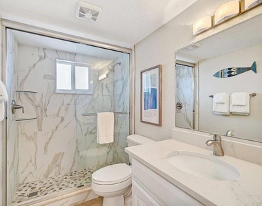 6154 Midnight Pass Road - Photo Thumbnail 6