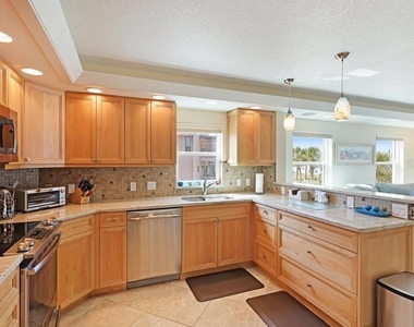6154 Midnight Pass Road - Photo Thumbnail 3