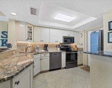 6154 Midnight Pass Road - Photo Thumbnail 4