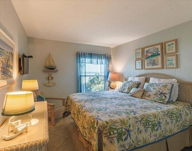 6154 Midnight Pass Road - Photo Thumbnail 6