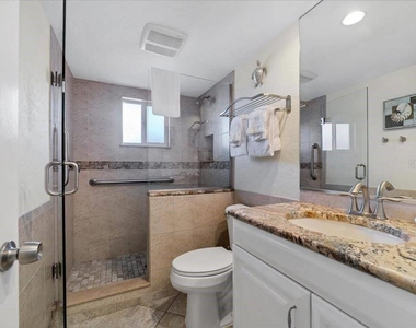6154 Midnight Pass Road - Photo Thumbnail 5