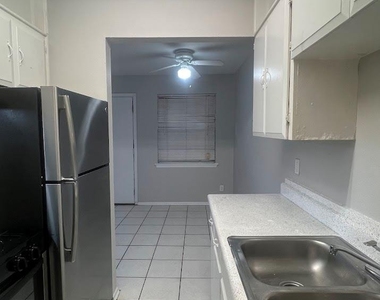 307 E 31st St - Photo Thumbnail 8