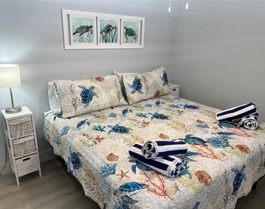 6020 Midnight Pass Road - Photo Thumbnail 9