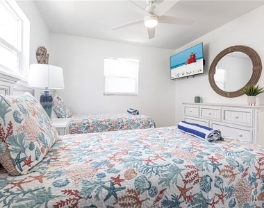 6020 Midnight Pass Road - Photo Thumbnail 2