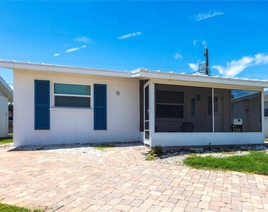 6020 Midnight Pass Road - Photo Thumbnail 4