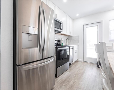 6020 Midnight Pass Road - Photo Thumbnail 9