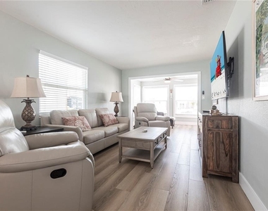 6020 Midnight Pass Road - Photo Thumbnail 4