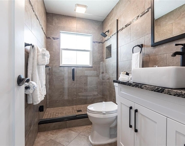 6020 Midnight Pass Road - Photo Thumbnail 10