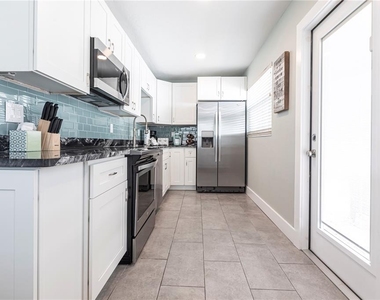 6020 Midnight Pass Road - Photo Thumbnail 9