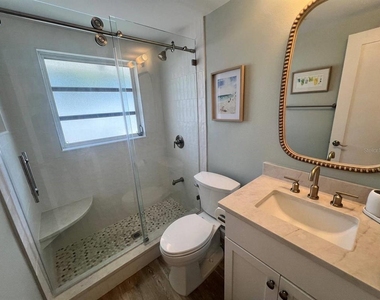 6020 Midnight Pass Road - Photo Thumbnail 11