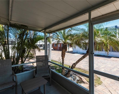 6020 Midnight Pass Road - Photo Thumbnail 4