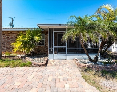 6020 Midnight Pass Road - Photo Thumbnail 2