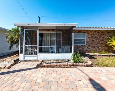 6020 Midnight Pass Road - Photo Thumbnail 8