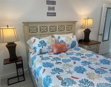 6020 Midnight Pass Road - Photo Thumbnail 10