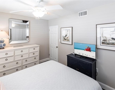 6020 Midnight Pass Road - Photo Thumbnail 3