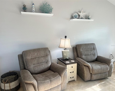 6020 Midnight Pass Road - Photo Thumbnail 3