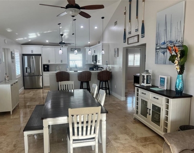 6020 Midnight Pass Road - Photo Thumbnail 6