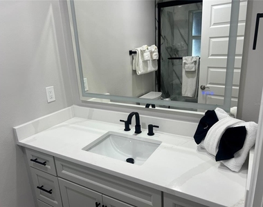 6020 Midnight Pass Road - Photo Thumbnail 13